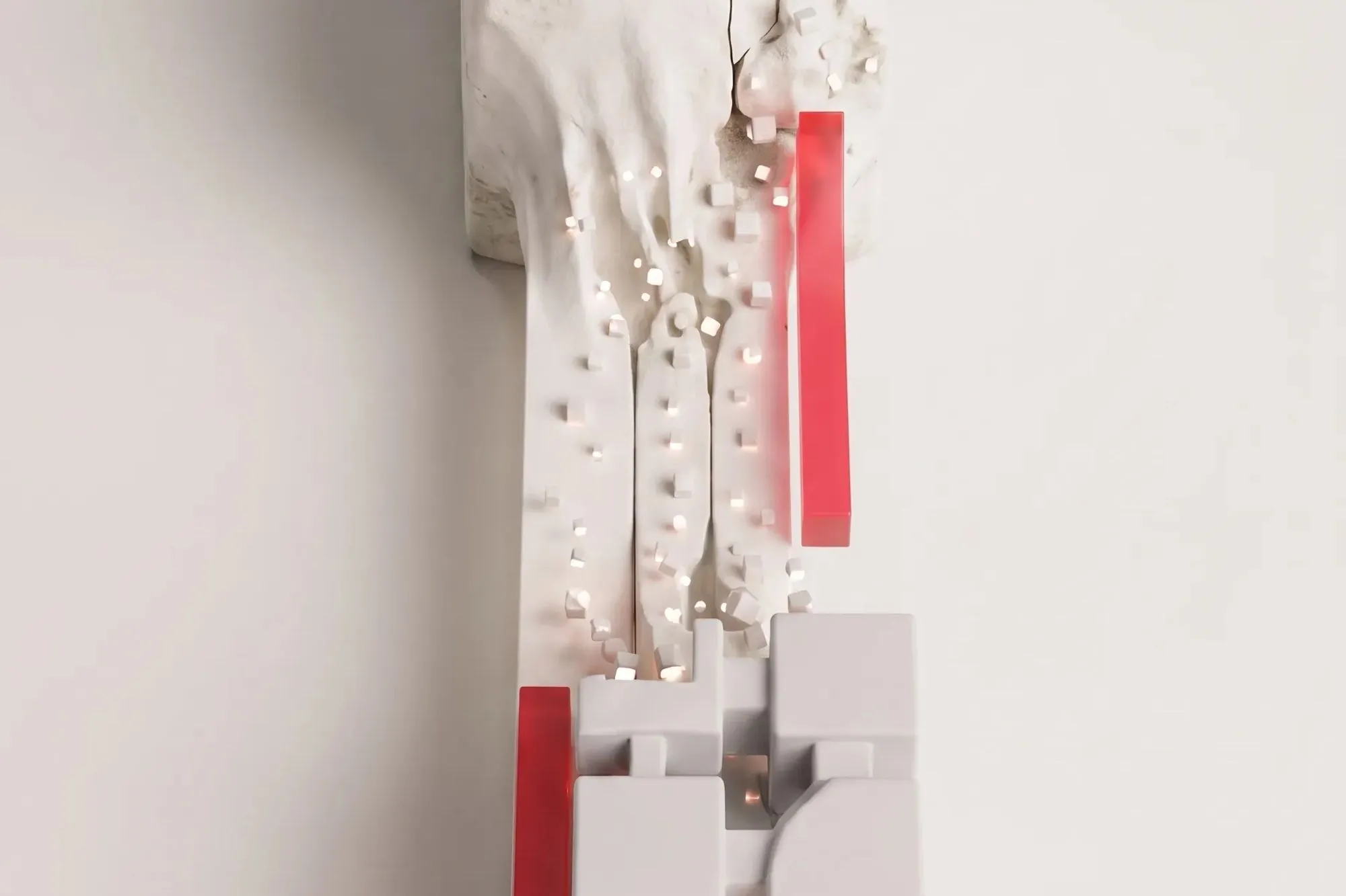 Cracked, stained white block breaking into small cubes that fall onto clean blocks, with red arrows