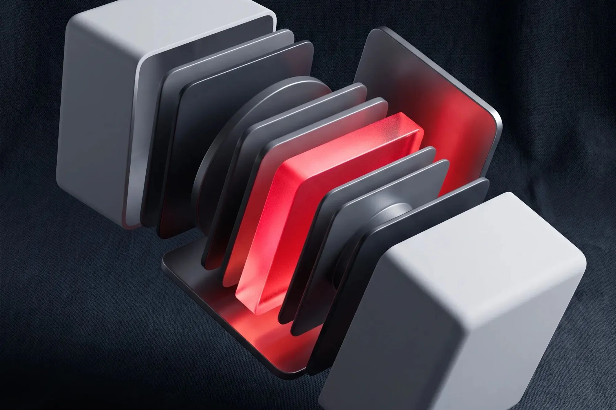 Dos cubos blancos separados que revelan capas grises apiladas con una roja brillante en el interior.