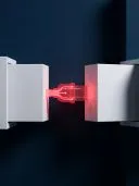 Glowing red plug joining two white blocks on a dark blue background.
