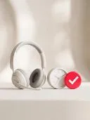 White headset with microphone beside a white clock and a red checkmark badge on beige.